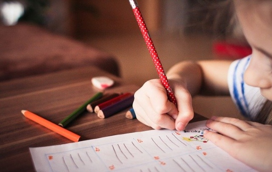 Child writing Child writing